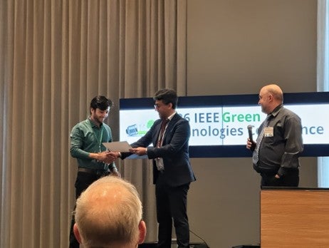 Bikal Pudasaini of Dominion Energy receiving the Best Conference Paper award at the  2026 IEEE Green Technologies Conference