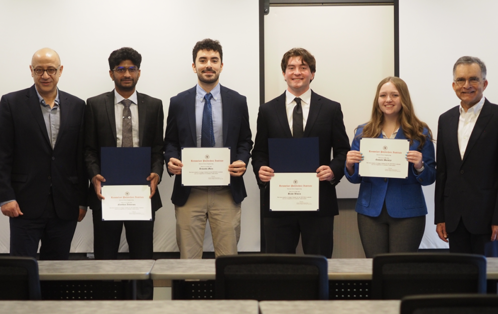 ECSE Department Head Prof. Hussein Abouzeid, Nandhan Anbarasu, Armando Mora, Brody Waters, Emmalie Barkley and Rana Mukerji
