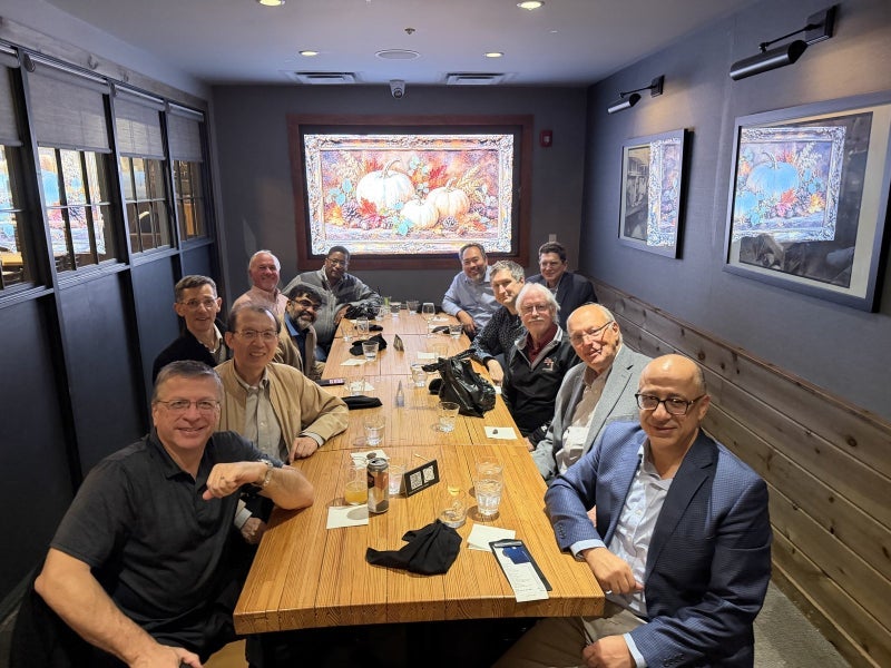Members of the ECSE Advisory Council with department faculty at dinner, October 2026